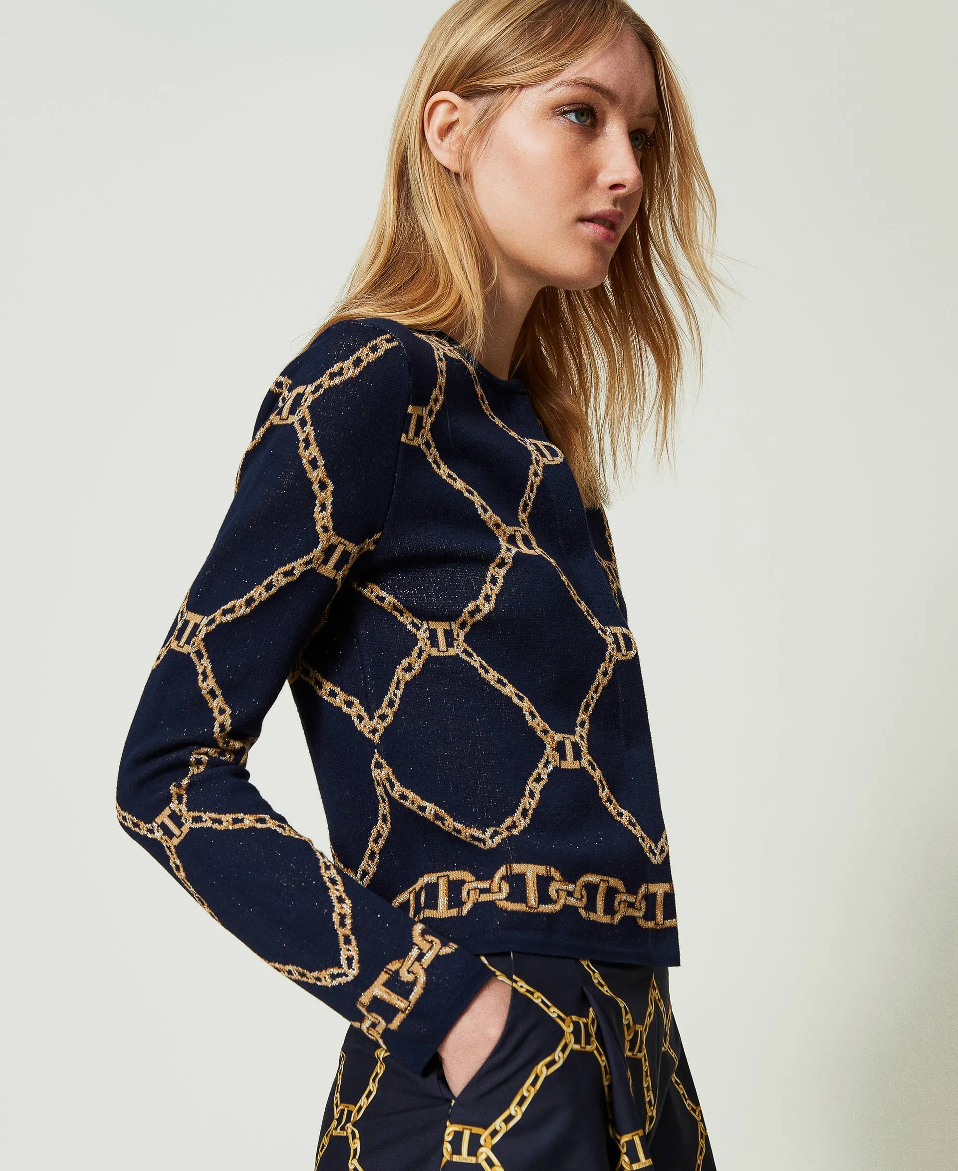 Chaqueta de punto jacquard con cadenas
