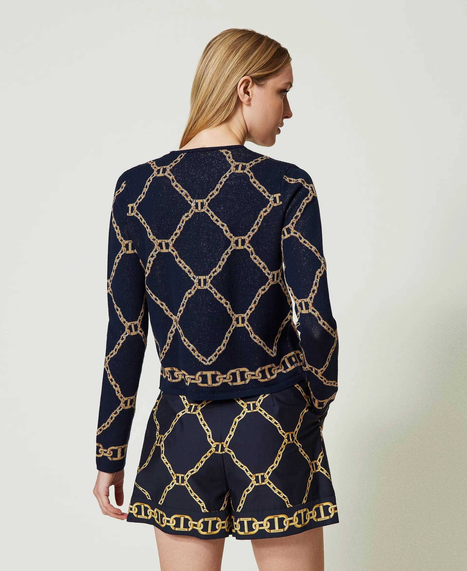 Chaqueta de punto jacquard con cadenas