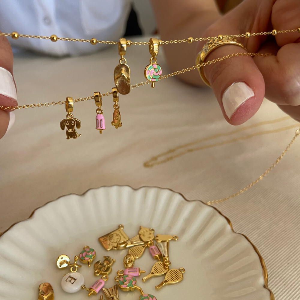 Reasa charm oro